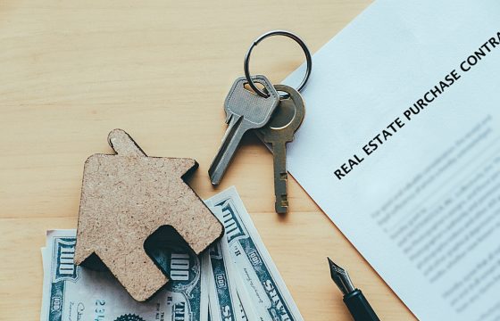 Real estate purchase concept idea. Sale and buy land and house.